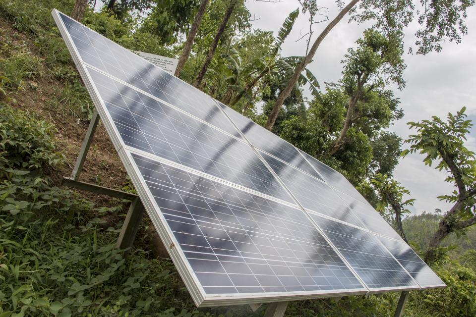 Solar panels power a water pump to bring irrigation water 68 meters from the river to the fields
