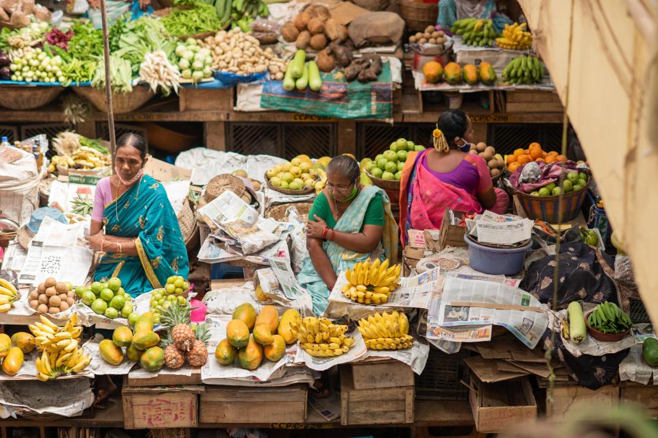 Fruit and vegetable vendors selling their product to locals, India