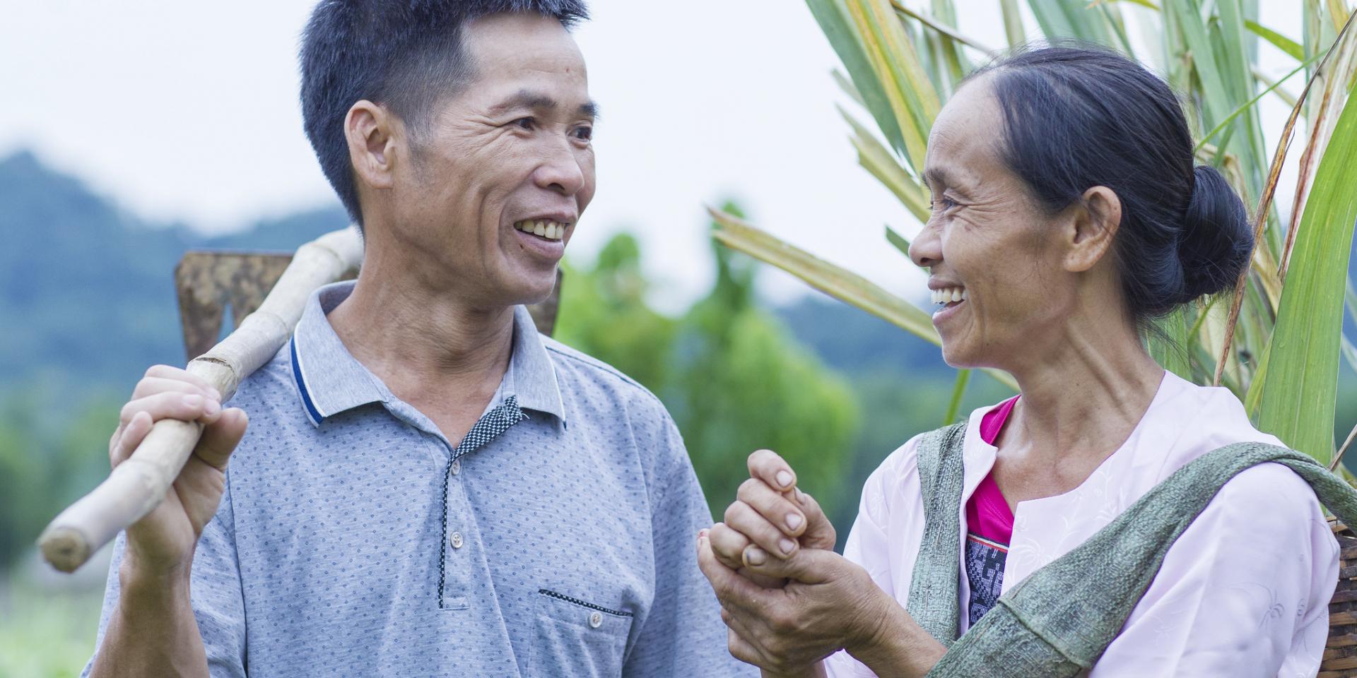 Bui Van Ben (left) and Dinh Thi Hong (right), Muong ethnic people grow rice and keep pigs, buffalos, chickens in their house to generate more incomes. Photo: ILRI/Vu Ngoc Dung.