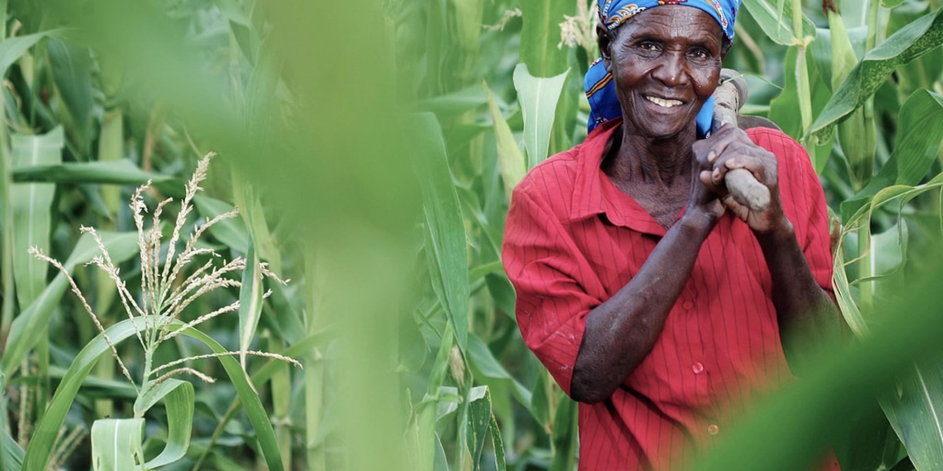 Woman farmer holding a jembe