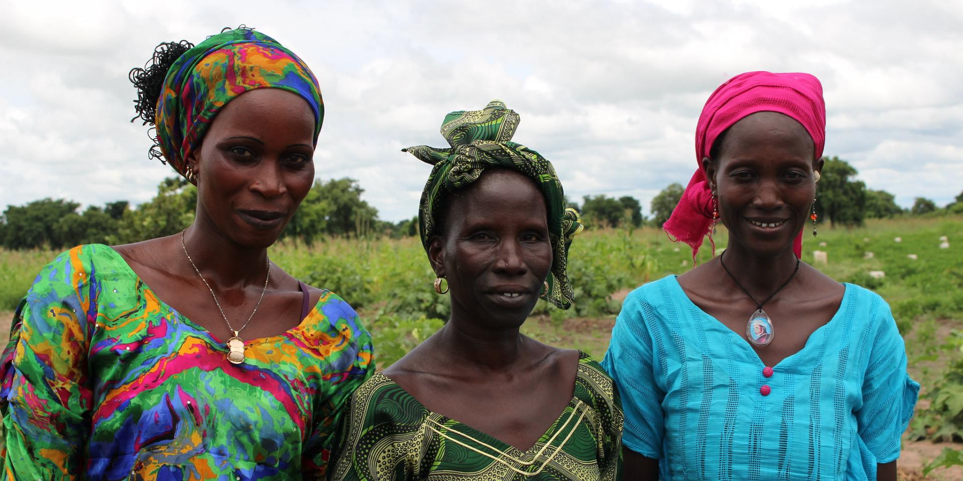 Ramatou Diouf (center) and her neighbours are part of of a women's farming group in Senegal that grow high-value crops for additional income. 