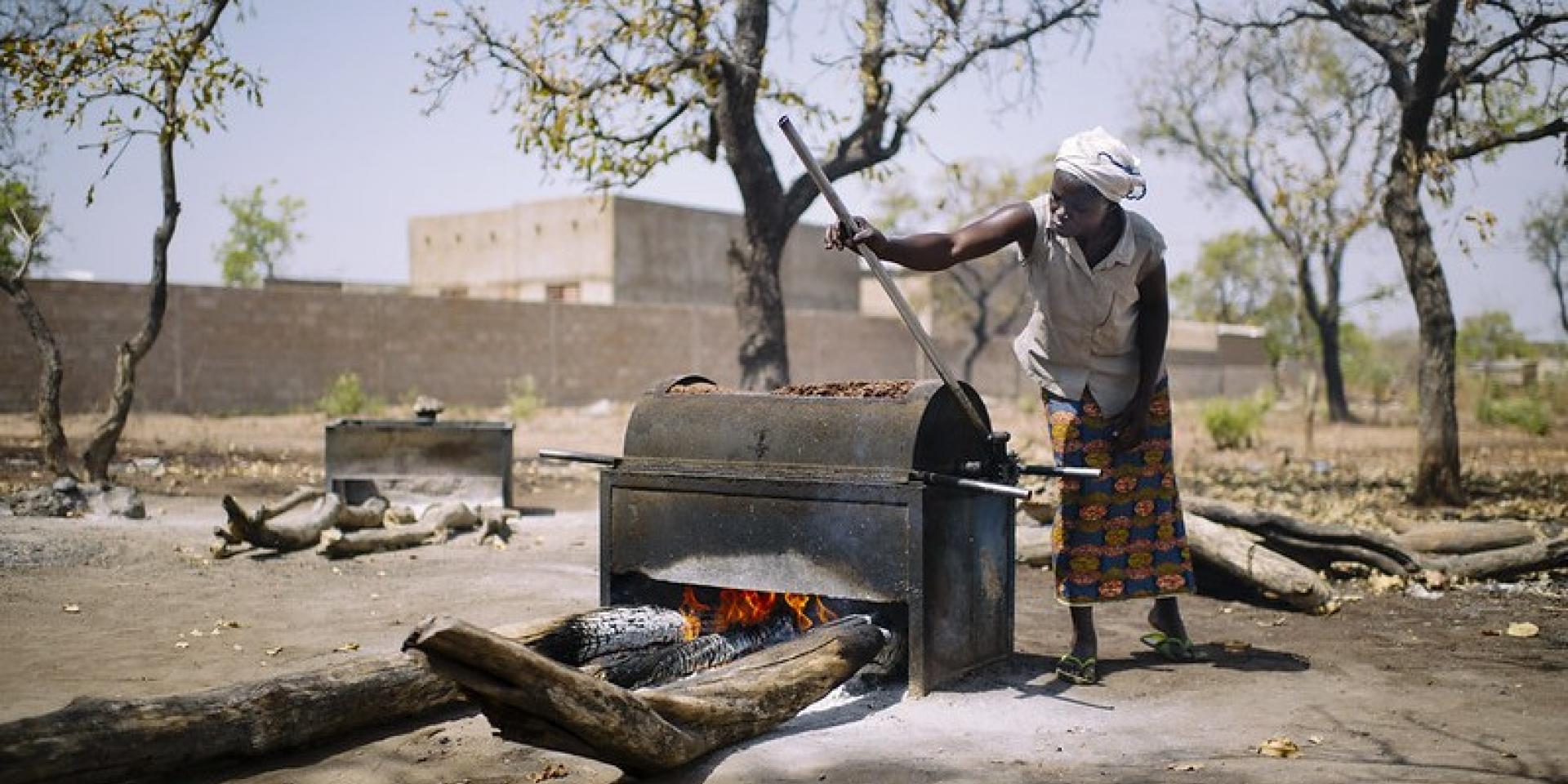 Woman roasting nuts 