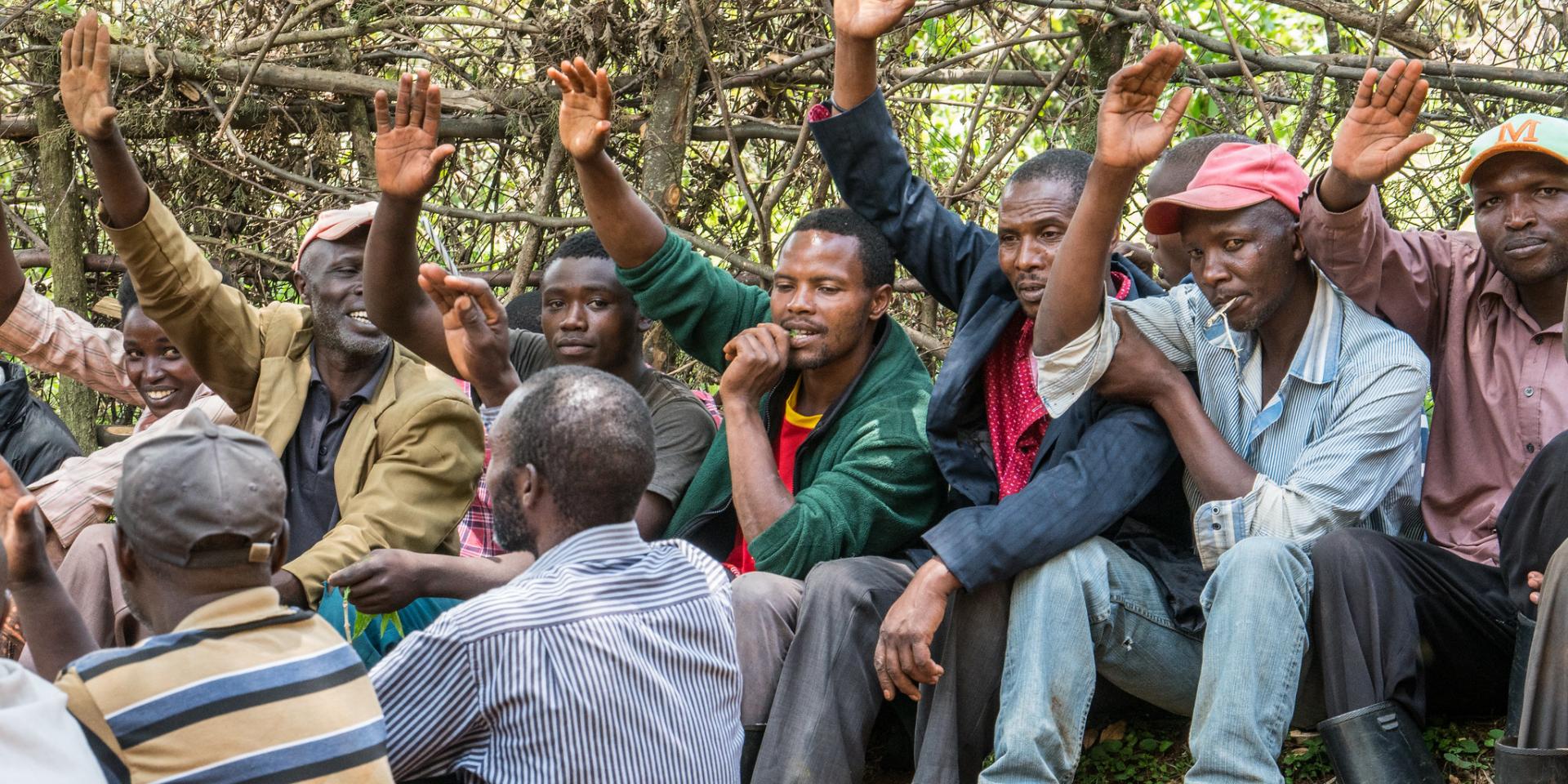 Men take a pledge towards Mau Forest restoration initiatives in Kenya. Photo: Patrick Shepherd/CIFOR