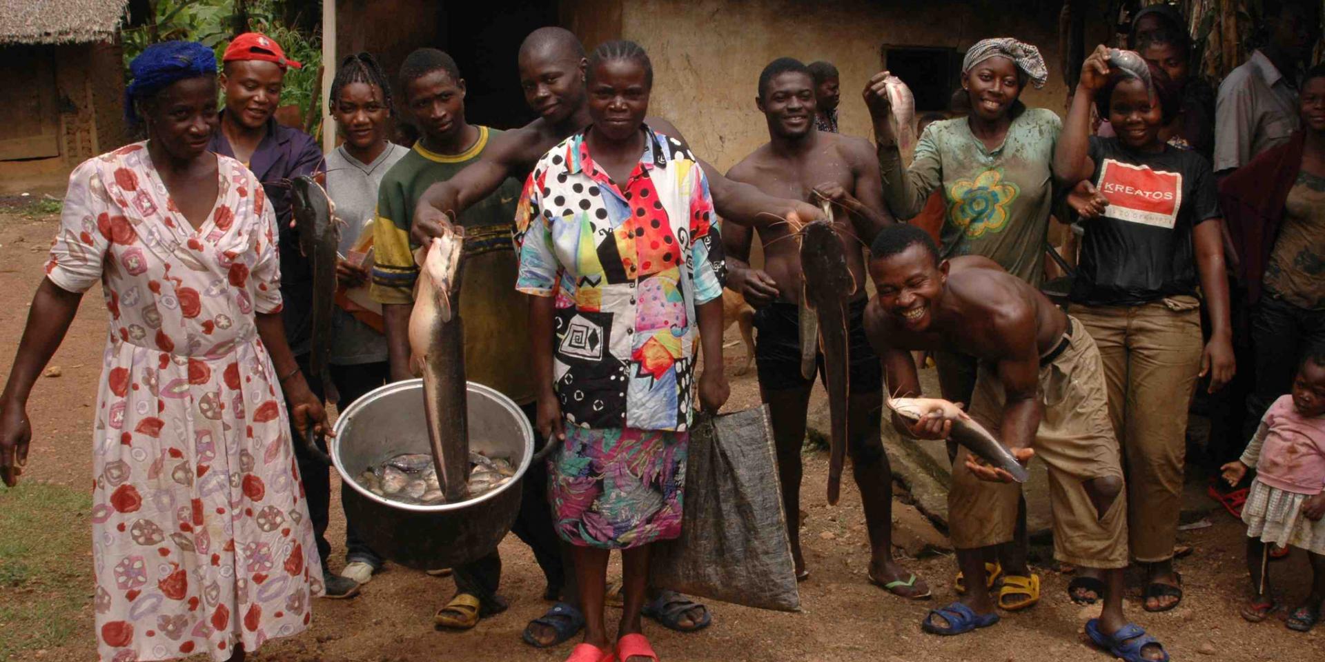 Villagers with their fish