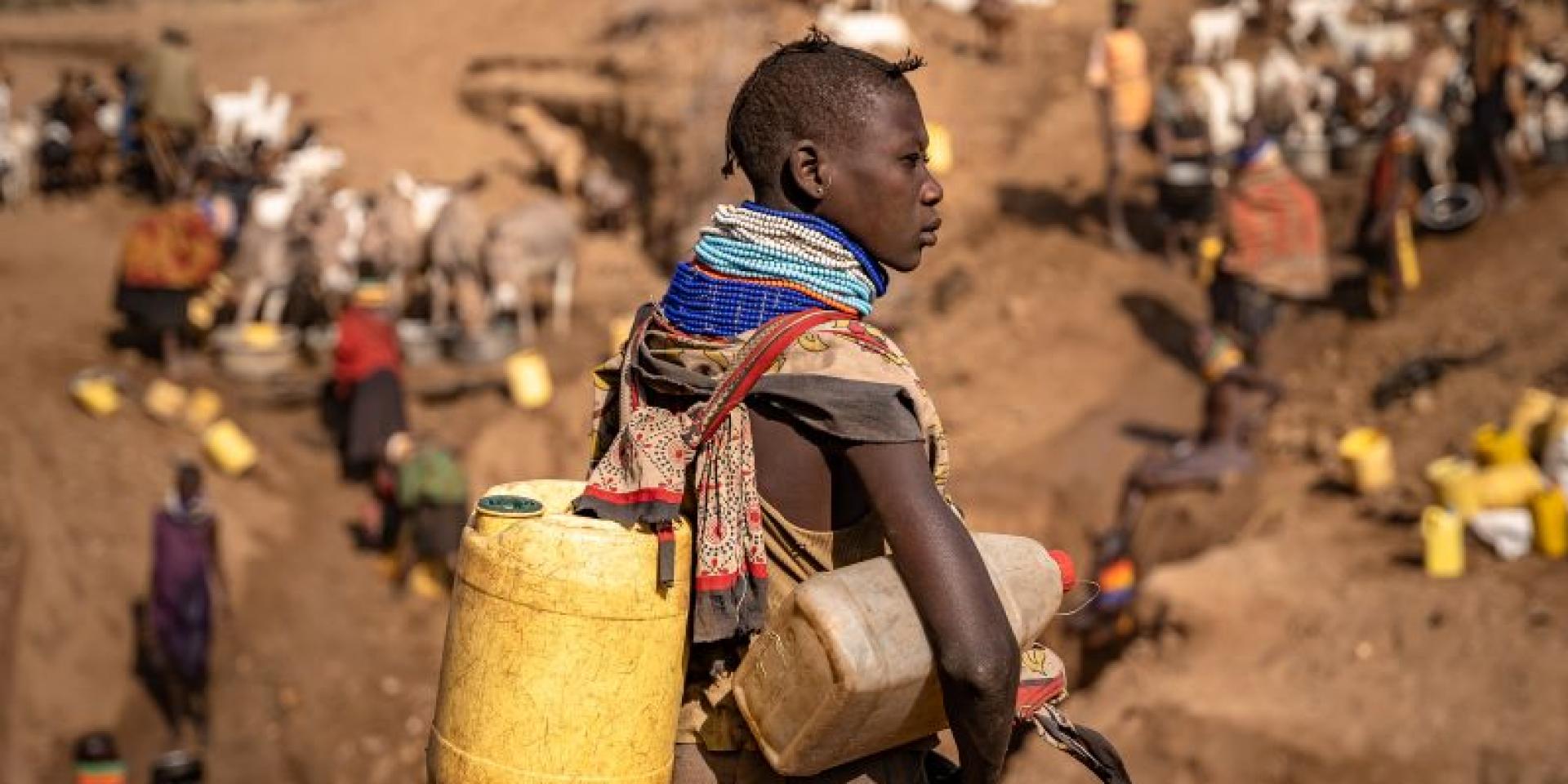 A woman with plastic containers