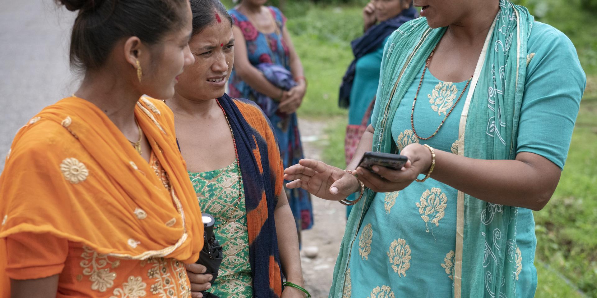 Photo of women and researcher in Nepal