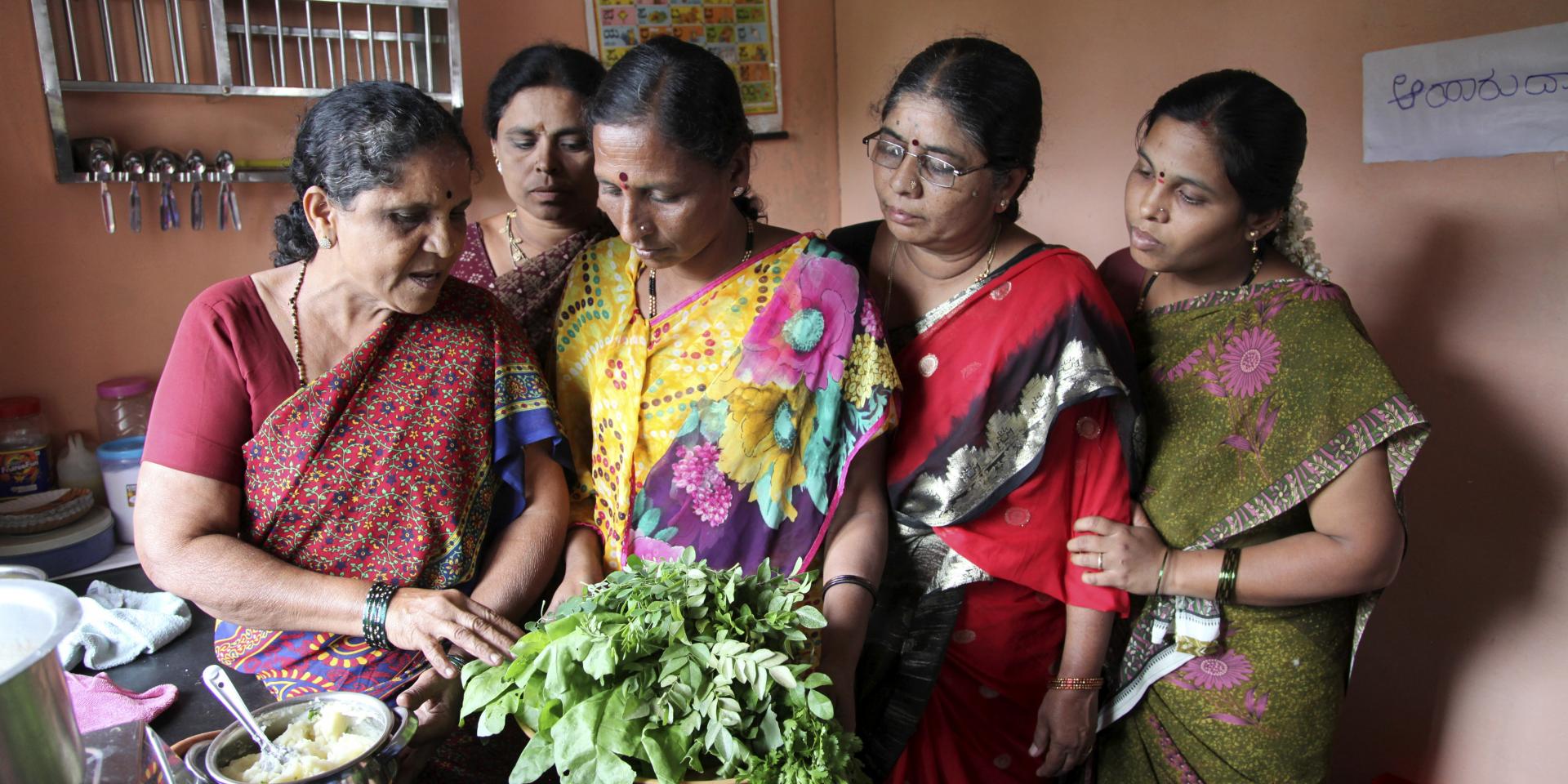 Women discuss food and nutrition during a meeting 