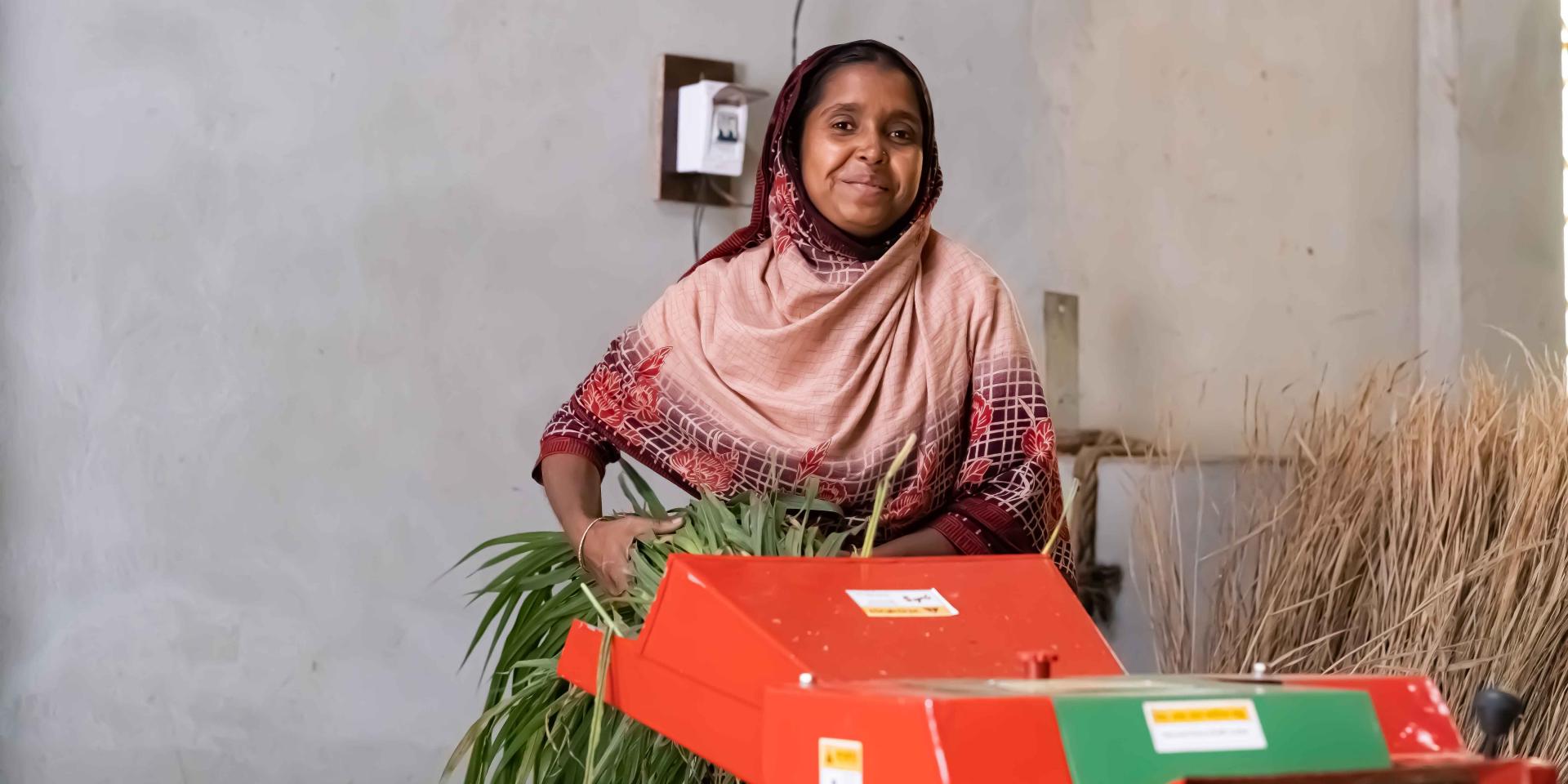 Salma uses a fodder chopper