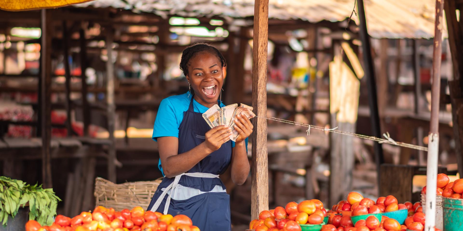 Woman farmer selling produce at the market