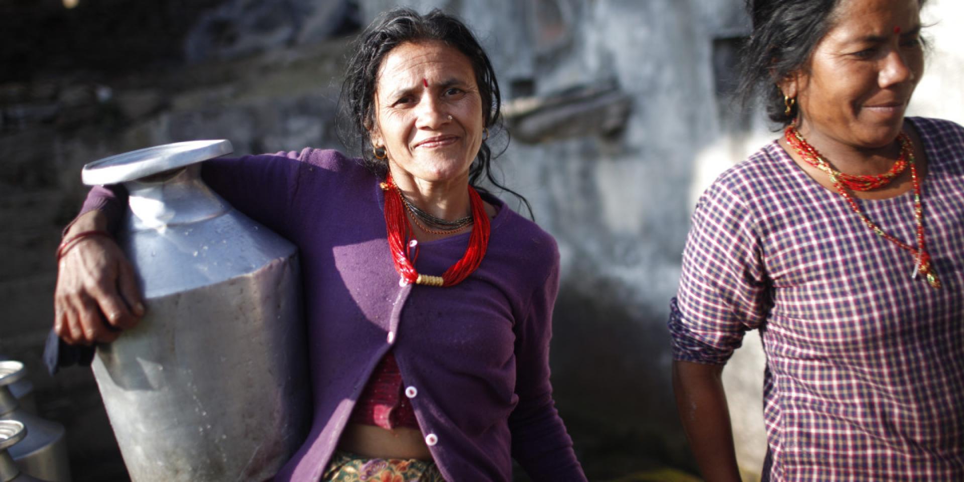 Women carrying jars