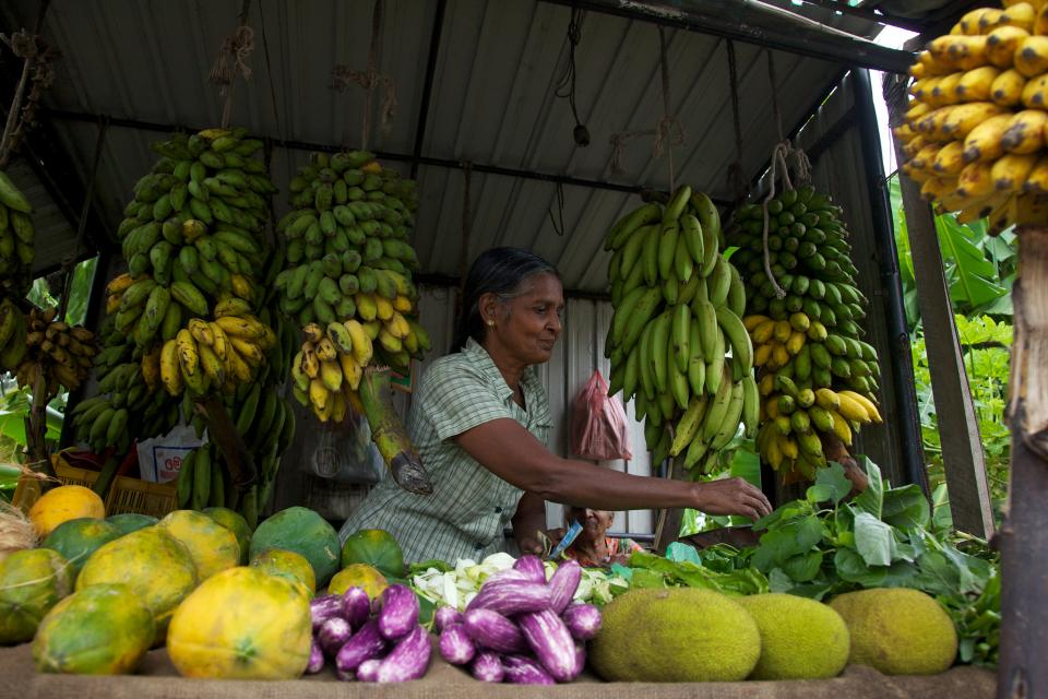 Selling fresh vegetables in a market