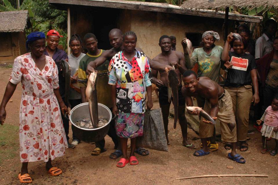 Villagers with their fish