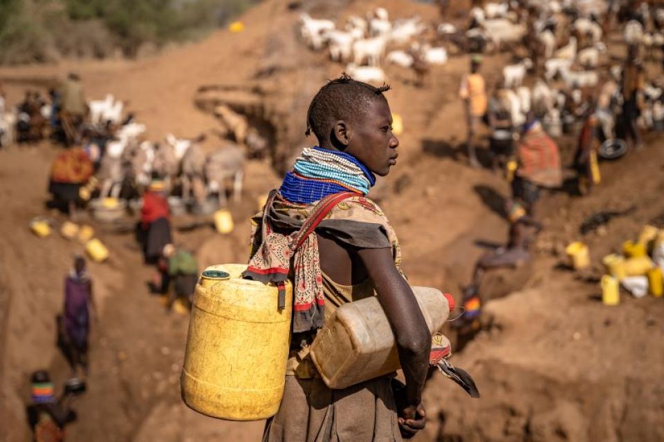 A woman with plastic containers