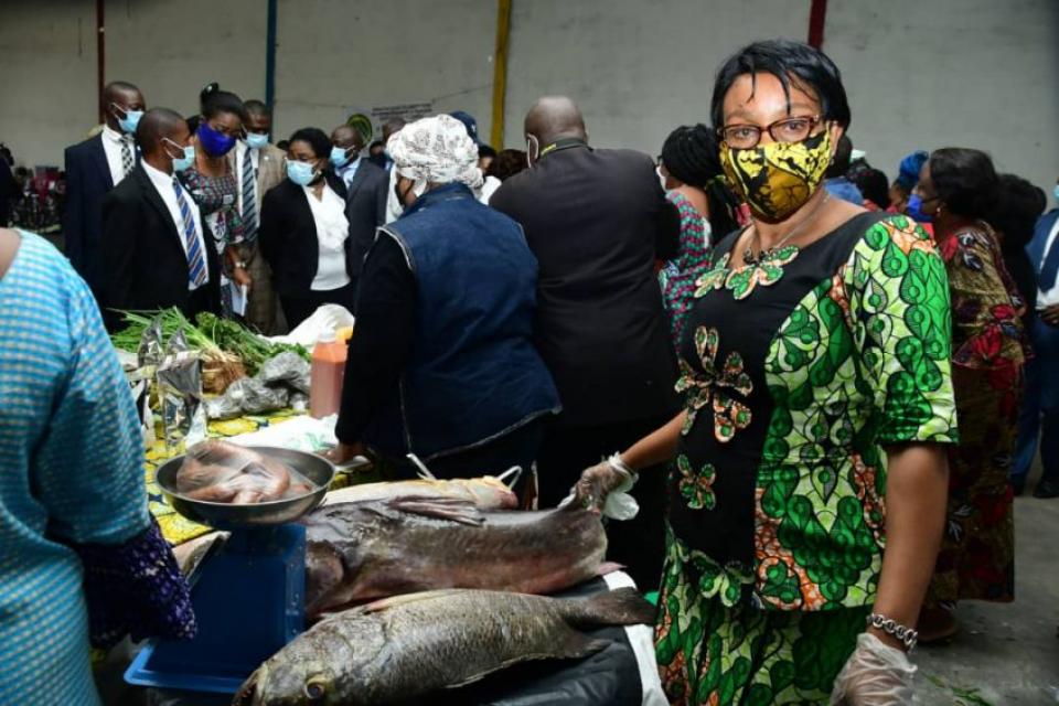 Photo of woman with fish