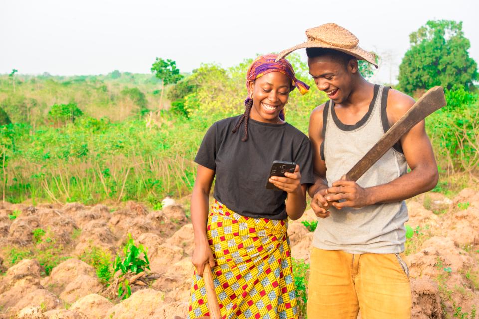 Young woman and man in a farm