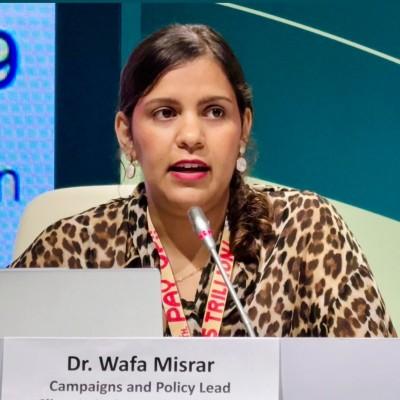 Headshot of Wafar speaking in a conference
